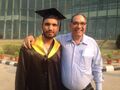 Ram Niwas Chaudhary with his son on graduation